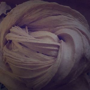 A pink butter slime sented like shaving cream